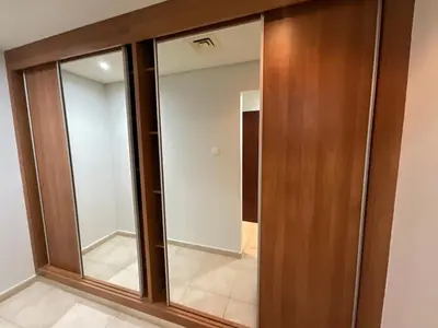 a sliding glass door in a room at Stunning Marina View! CoLiving Rooms in Princess Tower Marina in Dubai