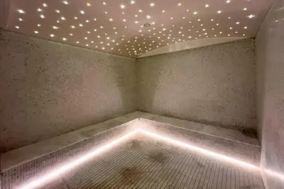 a room with a ceiling with stars on it at GuestReady Holiday Homes - Arabian Elegance in JVC in Dubai
