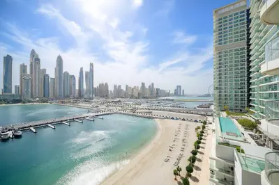 a view of a city with a bridge and a beach at Silkhaus Full Marina View 2BDR in Unique New Tower in Dubai