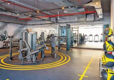 a gym with some equipment in a room at HAVN - 2 Bedroom Apartment with Dubai Marina View in Dubai