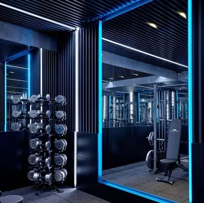 a room with a wine cellar with blue lights at Private Studio Burj Khalifa Area -BEST PRICE in Dubai