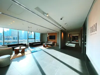 a large lobby with a view of a building at Downtown Views II Burj Khalifa View, Downtown Dubai - Mint Stay in Dubai