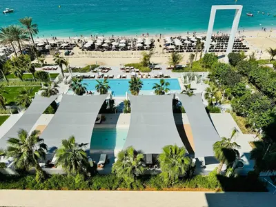 an aerial view of a resort with a beach at Luxury Brand New 2 Bhk Apartment In La Vie -jbr in Dubai