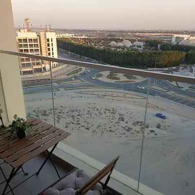 a balcony with a view of a parking lot at Jwelz By Danube in Dubai