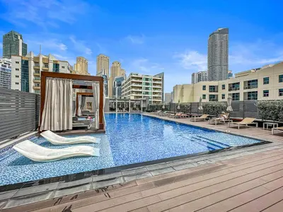 a large swimming pool on the roof of a building at Summer offer! All Inclusive! Prime Location in Dubai