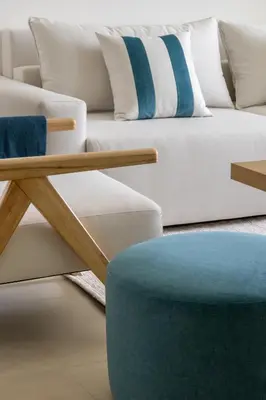 a living room with a couch and a table at Stunning 2 Bedroom Apartment with Burj Views by Zen Stays - Walking Distance to Dubai Mall in Dubai