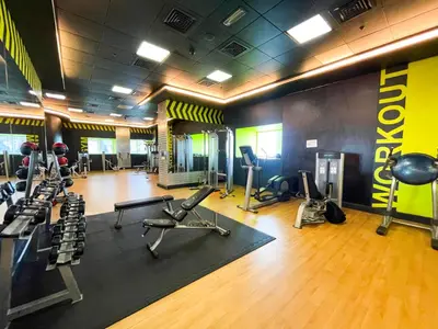 a gym with several treadmills and exercise equipment in it at Deluxe - Sea view - Dubai Marina in Dubai