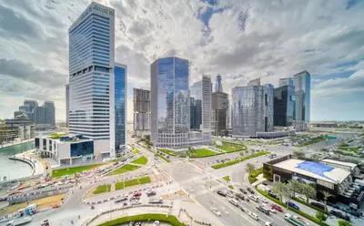 a view of a city with traffic and buildings at Welcoming 1BR Apartment in Ahad Residences Business Bay by Deluxe Holiday Homes in Dubai