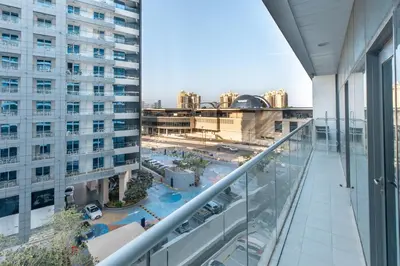 a view from the balcony of a building at SEVEN PALM by Design Studio 1BR in Dubai