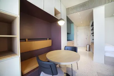 a small dining room with a table and chairs at Studio with Burj Khalifa View - Upside Living in Dubai