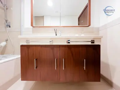 a bathroom with a sink and a mirror at Burj Vista Burj Khalifa Metro & Mall Access in Dubai