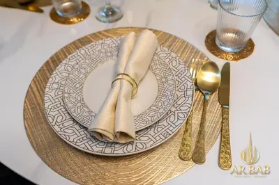 a table with a plate with two napkins on it at Bahar - Luxury 1BR - Near JBR Beach - Prime Location - JBR in Dubai