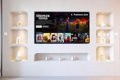 a wall with two movie posters on it at Burj Khalifa View, High Floor, Dubai Mall Access, Gym, Infinity-Pool, Playground, BBQ, Family Friendly in Dubai
