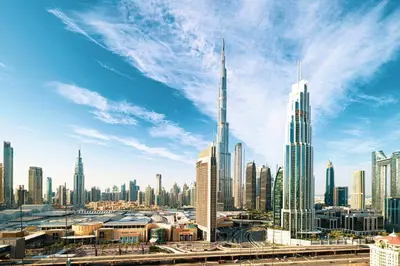 a view of a large city with tall buildings at Burj Khalifa View, High Floor, Dubai Mall Access, Gym, Infinity-Pool, Playground, BBQ, Family Friendly in Dubai