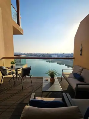 a patio with a view of the water at Studio *stunning SEA VIEW* in Dubai