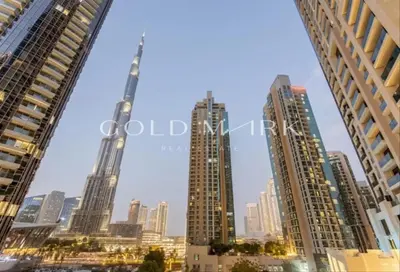 a view of a city skyline with tall buildings at Downtown Dubai Mall walk & Burj Khalifa DIFC 5 mins in Dubai