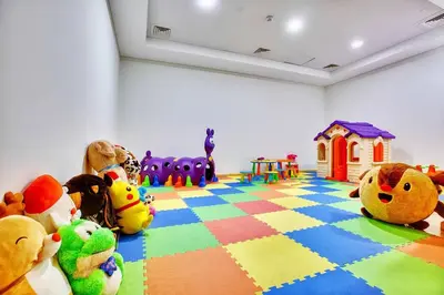 a group of stuffed animals sitting on the floor in a room at Luxurious & Modern 2BR Plus Maid, Sparkle Tower Dubai Marina - 10AB4 in Dubai