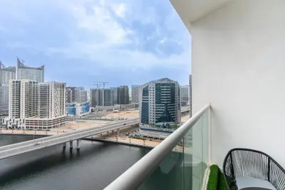 a view of a city skyline from a balcony at Mystic - Damac Maison Prive Tower B in Dubai