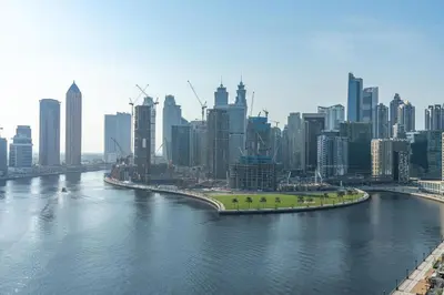 a view of a river with a city in the background at Mystic - Damac Maison Prive Tower A in Dubai