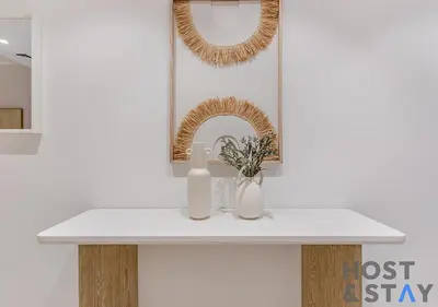 a bathroom counter with a sink and a mirror at Luxury Studio at Wilton Park - MBR in Dubai