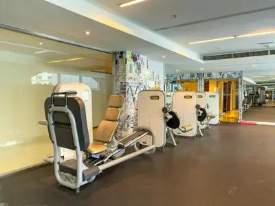 a row of empty chairs in a gym at Maison Privee - Modern Beach Living in the Heart of Dubai Marina in Dubai