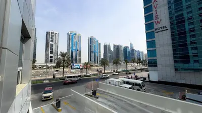 a view of a city street with cars and buildings at Dubai Marina - Modern Designed - Gorgeous Studio- Close Metro Station in Dubai
