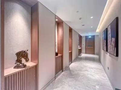 a hallway with a statue of a horse on display at Amazing 2BR Burj Kalifa View in Dubai