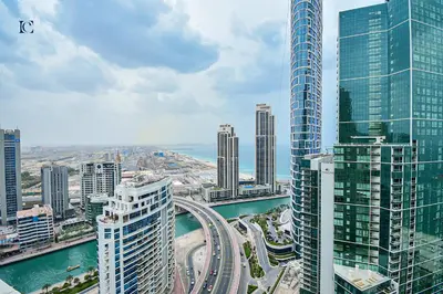 a view of a city with tall buildings at Luxury Escapes - Amazing Sea View - 4 Bedrooms Apt with Maids room in JBR in Dubai