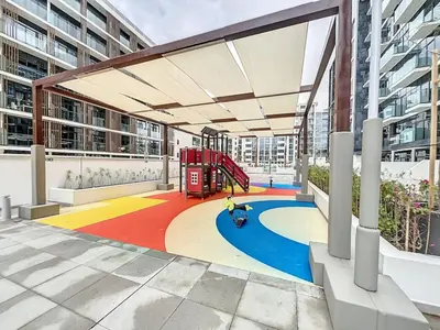 a playground in the middle of a building at Azizi Riviera 16 - Charming Studio in Dubai