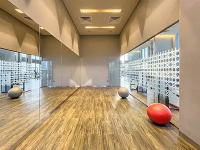a bowling alley with two balls on the floor at 5242 Tower 2 - Chic Two Bedroom in Dubai