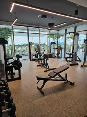 a gym with several treadmills and exercise bikes at Experience Bliss 1BR Haven with Stunning Sea Views - 50AB1 in Dubai