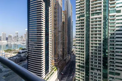 an aerial view of a city with tall buildings at 1BD apartment in Torch Tower, Dubai Marina in Dubai