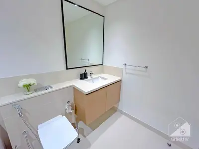 a bathroom with a sink and a mirror at Burj Crown Luxury 2-Bedroom with Balcony in Dubai