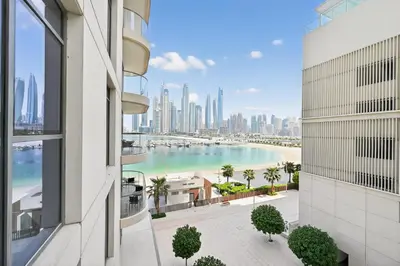 a view of the city from a building at Seascape Sanctuary - 3 and a Half BR Beachfront Bliss - Marina Vista Tower 1 in Dubai