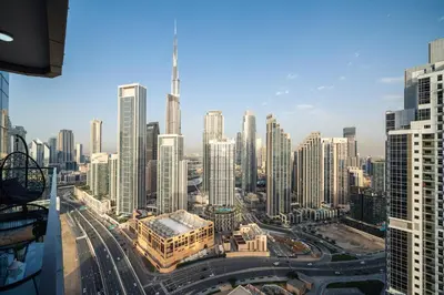 a view of a large city with tall buildings at Super High Infinity Pool & Stunning Burj Khalifa View, 3-Bedroom Apartment at Paramount Hotel Midtown in Dubai