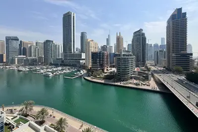 a view of a city with a river and buildings at Luxury apartment 3 beds Marina view in Dubai