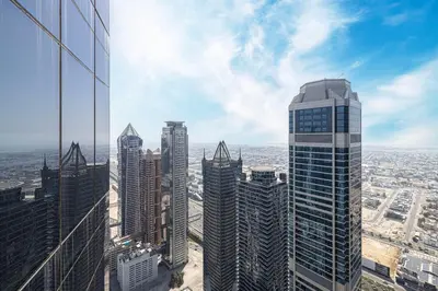 an aerial view of a city with tall buildings at SmartStay at Paramount Tower - Sea and Downtown Views - Infinity Pool - Modern Luxury Residences in Dubai