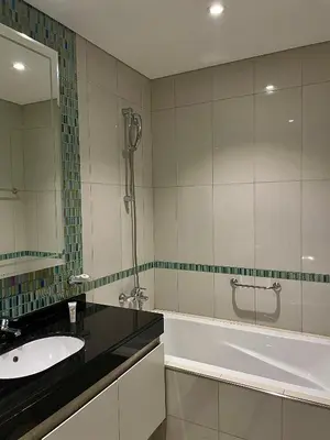 a bathroom with a sink and a tub and a shower at Apartment Dubai Marina, Damac Heights 804 in Dubai