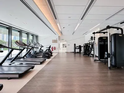 a gym with treadmills and cardio equipment in a building at Trophy Live in the Sky Luxury Moon Collection Suites with DIFC Views 45Th Floor in Dubai