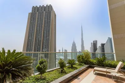 a view of the city from the balcony of a building at Silkhaus Modern Studio in The Heart of DIFC in Dubai