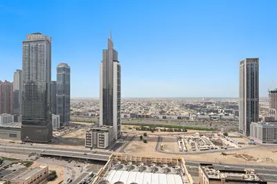 a view of a city skyline with tall buildings at Luxurious 2 BR in Downtown Dubai in Dubai