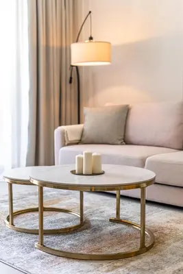 a coffee table in a living room with a couch at SettlerHomes - Marvelous Lagoon Stay With Pool View in Dubai