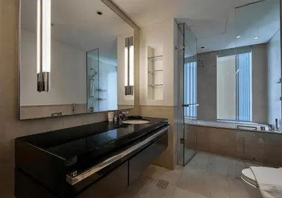 a bathroom with a sink and a mirror at Dubai Marina Residences, Studio with Balcony Connected to Marina Mall in Dubai