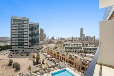 a view of a city from a building at Stunning modern 3BR apartment in JVC in Dubai