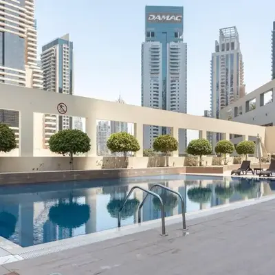 Stylish 1BR Apartment with City View Balcony Pool and Parking