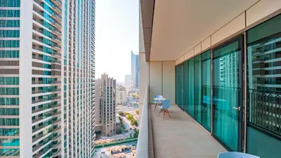 an apartment balcony with a view of a city at Burj Khalifa view with Grass Turf Balcony-Downtown by Tanami Holiday Homes in Dubai