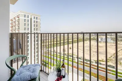 a balcony with a view of a building at Frank Porter - Socio Tower 2 in Dubai