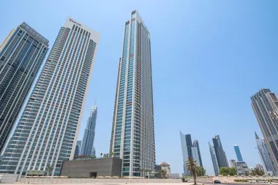 a group of tall buildings in a city at Silkhaus Ultra Luxury 1BDR in New Tower of Downtown in Dubai