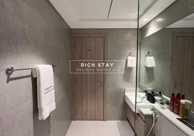 a bathroom with a sink and a mirror at Exceptional 1 BR in Prive Residences Dubai Hills in Dubai
