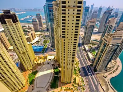 a model of a city with many tall buildings at Modern, spacious, Luxe 5BR plus Maid condo in JBR, near JBR Beach, Marina view, By La Buena Vida Holiday Homes in Dubai